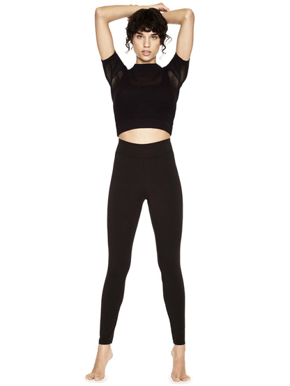 Luxury women's organic cotton leggings in soft black, designed for comfort and eco-friendliness.