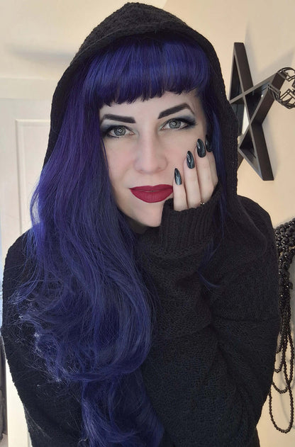 Close-up of the soft knit fabric of the Necessary Evil Athena Long Hooded Gothic Cardigan, highlighting quality craftsmanship and luxurious feel.