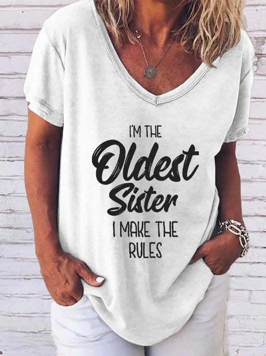 Close-up view of the premium fabric of the 'I'm The Oldest Sister' Tee by Dazzling Dreams Studio, showcasing comfort and luxury for fashionable women.