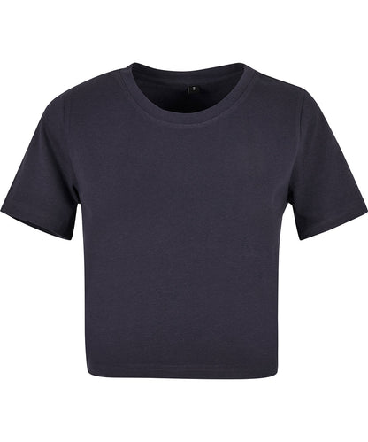 Organic Cotton Stretch Cropped T-Shirt for Women, showcasing its soft and breathable fabric in an elegant summer setting.