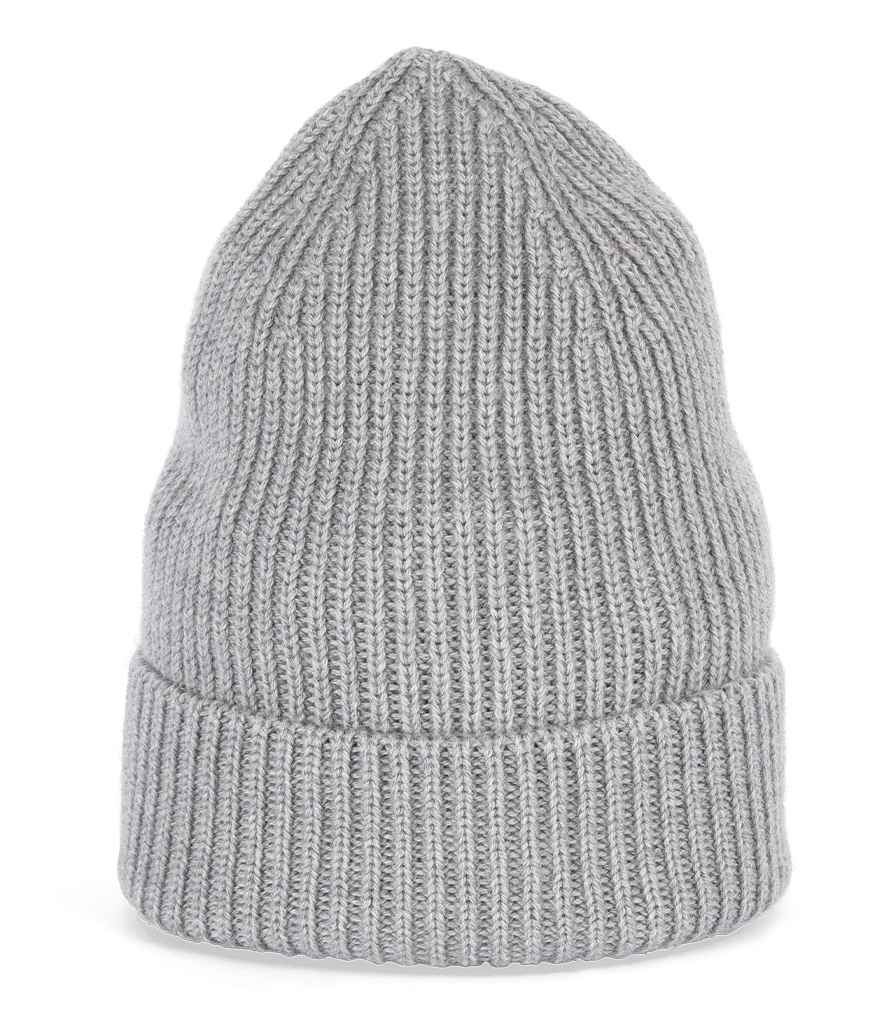 Luxurious unisex merino wool beanie in soft, warm taupe colour with wide turn-up, perfect for stylish winter fashion.