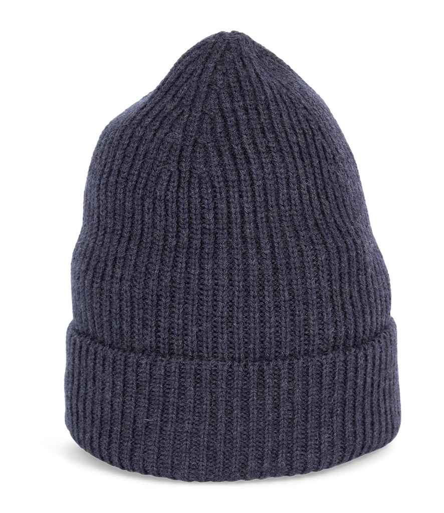 Soft and elegant Merino wool beanie, perfect for winter fashion, featuring a contemporary rib knit style that suits every outfit.