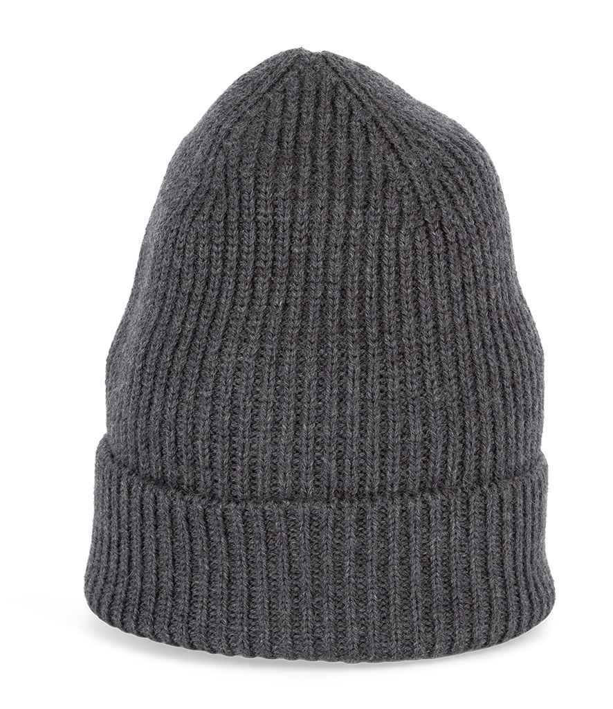 Artistic flat lay of luxurious unisex merino wool beanie with rich texture, complementing a stylish winter wardrobe.