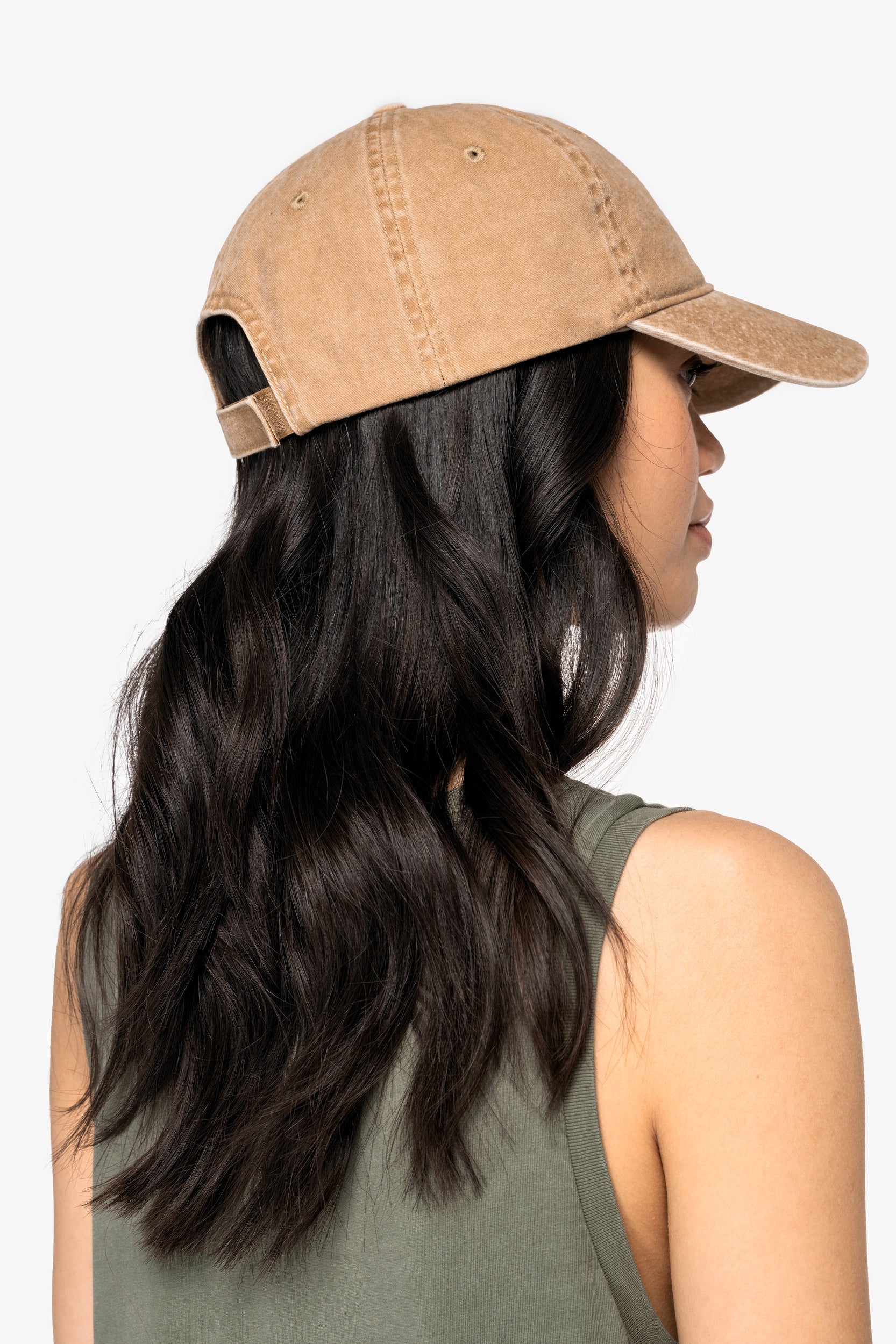 Luxury organic cotton faded cap displayed against a minimalist background, emphasizing its elegant design.