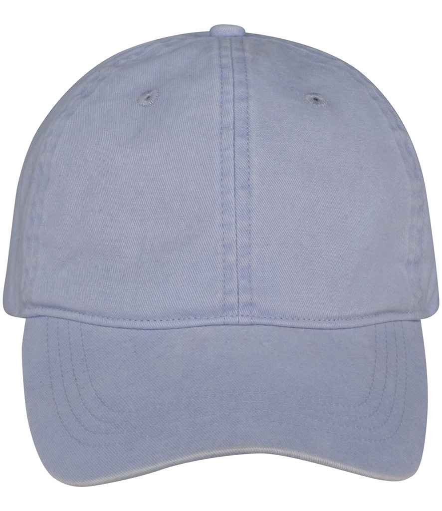Luxury organic cotton faded cap displayed in a natural setting, emphasizing its unique faded appearance and eco-friendly materials.