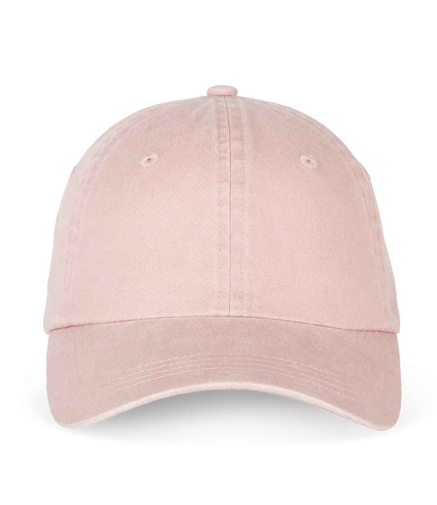 Close-up of the organic cotton texture of the faded cap, highlighting the luxurious feel and craftsmanship.