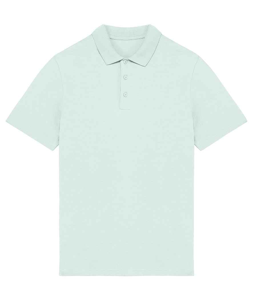 The luxury organic cotton polo shirt styled with accessories, highlighting its suitability for upscale casual wear.