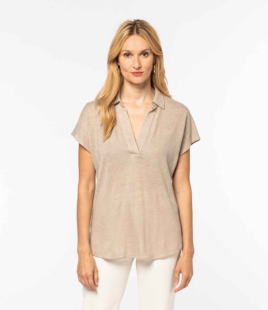 Luxury women's polo shirt made from 100% linen, featuring a classic V-shaped collar and delicate dropped sleeves.