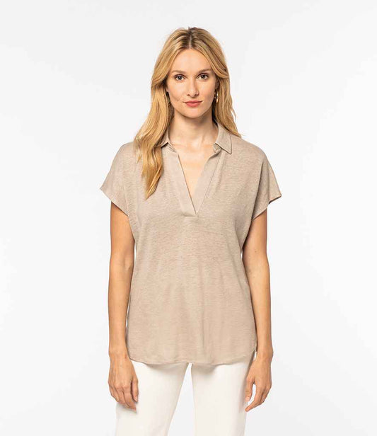 Luxury women's polo shirt made from 100% linen, featuring a classic V-shaped collar and delicate dropped sleeves.