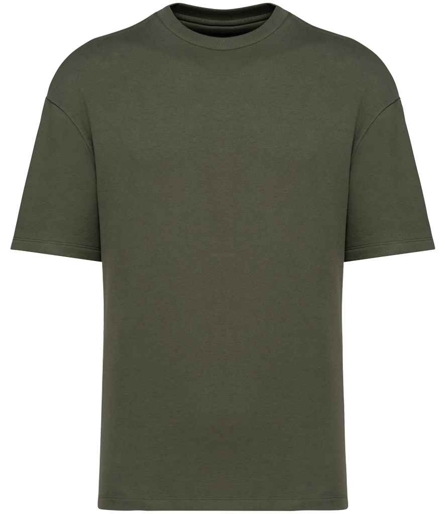 Model wearing the oversized organic French terry t-shirt, styled for a contemporary look, demonstrating the versatile and breathable nature of the fabric.