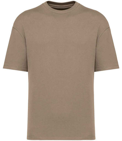 Elegantly styled organic oversized French terry t-shirt showcasing eco-friendly 85% cotton fabric in a soft enzyme-washed finish, perfect for a luxurious casual look.
