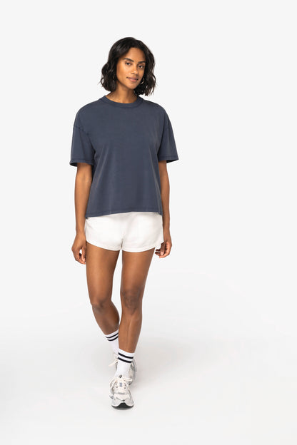 Close-up of the fabric texture of the Luxury Organic Oversized Washed T-shirt, highlighting the soft and durable qualities of 190 gsm jersey knit.