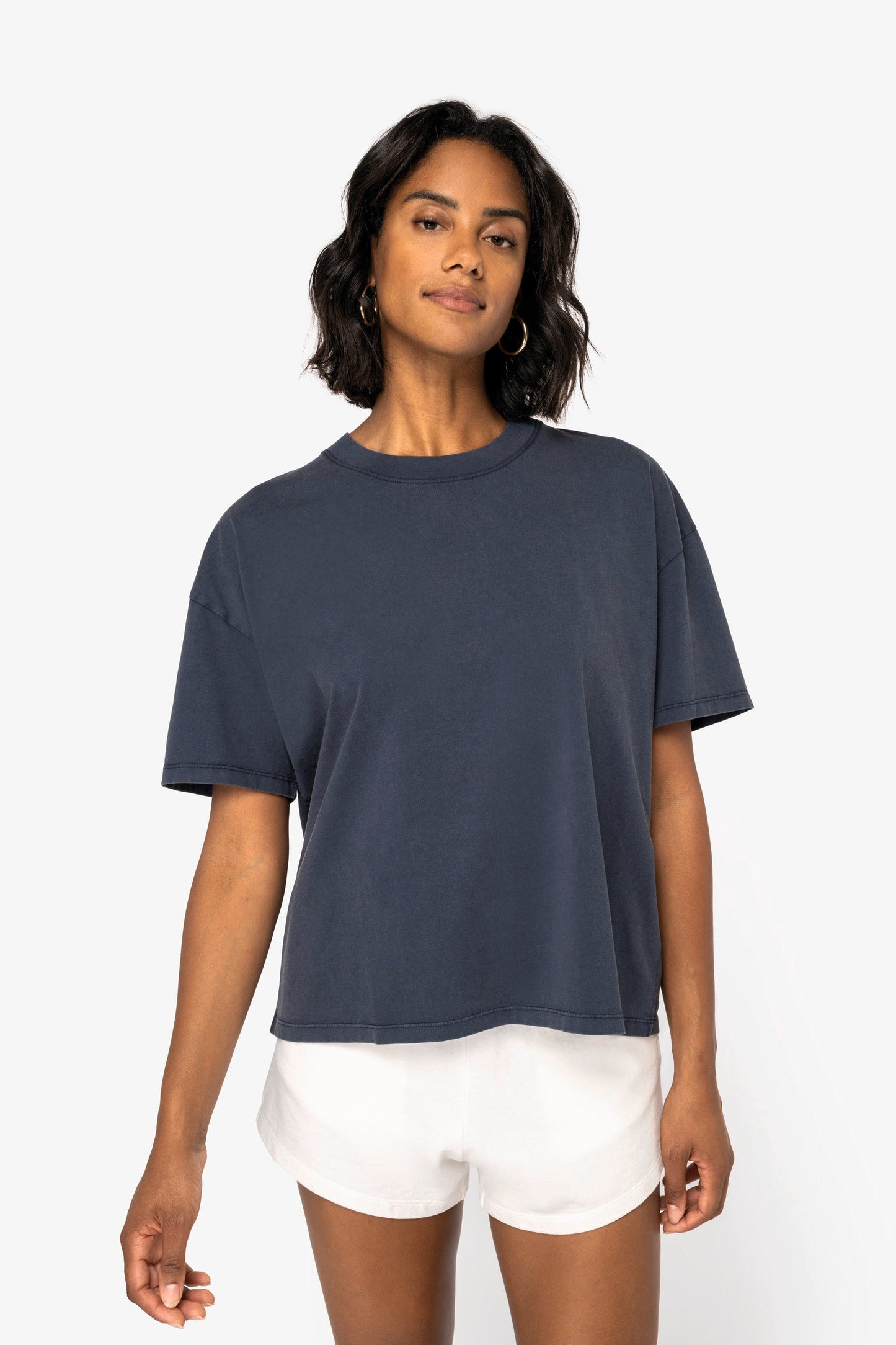 Luxury Organic Oversized Washed T-shirt for Women in serene pastel hues, crafted from 100% combed cotton, showcasing a unique garment dyed design.