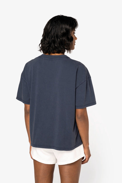 Stylish model wearing the Luxury Organic Oversized Washed T-shirt, demonstrating its relaxed silhouette and comfortable fit for everyday elegance.