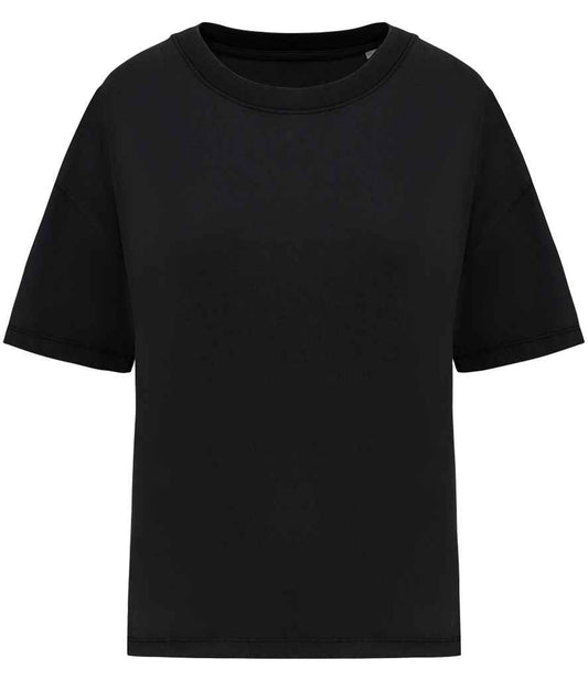 Luxury organic oversized washed t-shirt for women, crafted from 100% combed cotton with a unique garment dyed design showcasing its relaxed silhouette and soft texture.