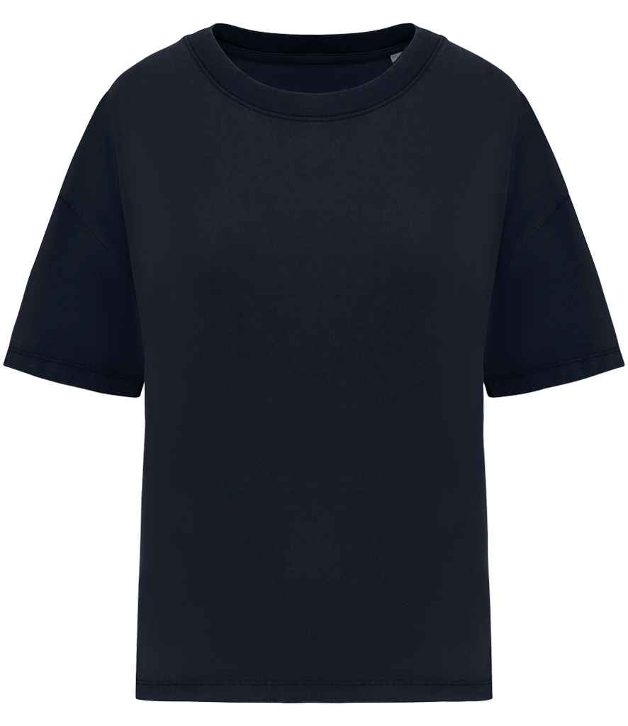 Close-up of luxury oversized t-shirt for women in organic cotton, highlighting the pre-washed finish and distinct color variation from the garment dyeing process.