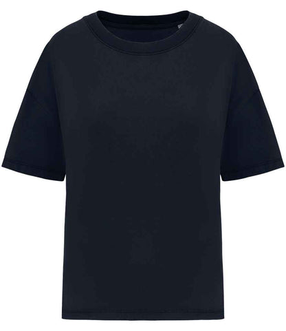 Close-up of luxury oversized t-shirt for women in organic cotton, highlighting the pre-washed finish and distinct color variation from the garment dyeing process.