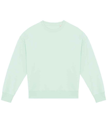 Stylish back view of a sustainable oversized unisex sweatshirt, highlighting the unique 1/2 circle design and tone-on-tone herringbone taping.