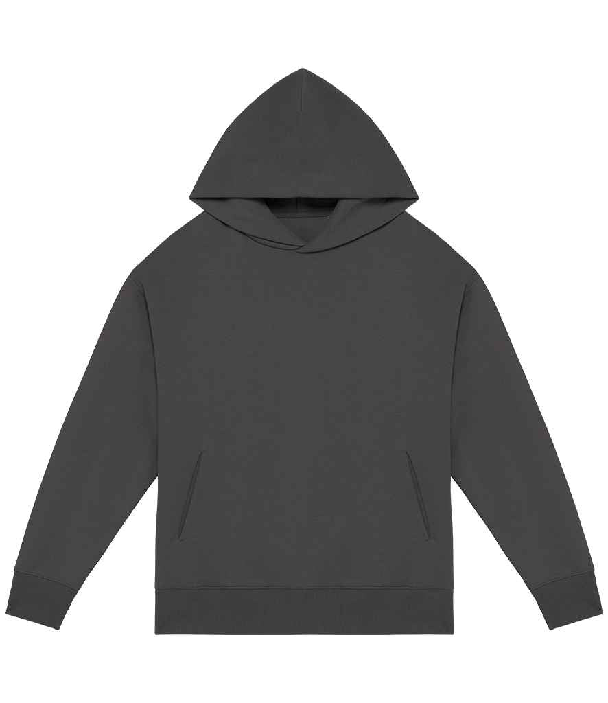 Beautifully styled organic cotton oversized hoodie draped elegantly, highlighting its unisex design and eco-friendly materials.