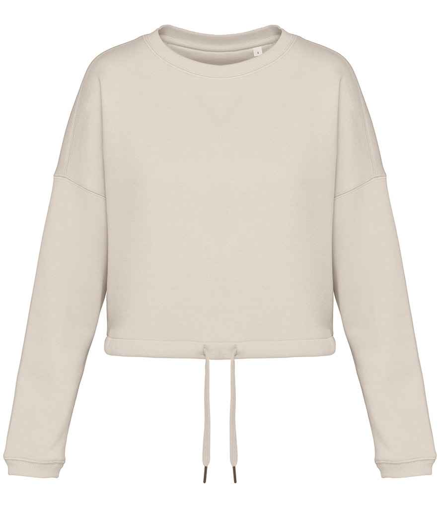 Elegant cropped hemline of the women’s oversized sweatshirt, designed for effortless pairing with high-waisted bottoms for a chic casual look.
