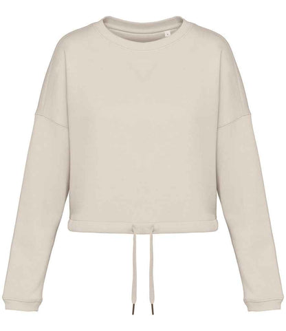 Elegant cropped hemline of the women’s oversized sweatshirt, designed for effortless pairing with high-waisted bottoms for a chic casual look.