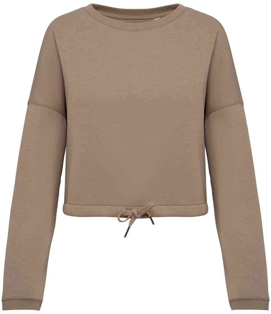 Detail view of the cropped hemline of the women's sweatshirt, designed for modern layering and chic casual looks.