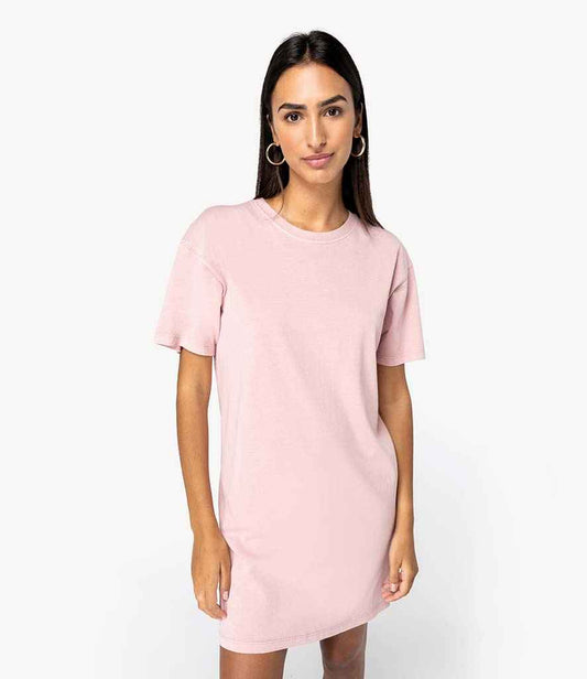 Luxurious organic cotton stonewash t-shirt dress in soft fabric, designed for casual elegance and comfort, showcased in a beautiful setting.