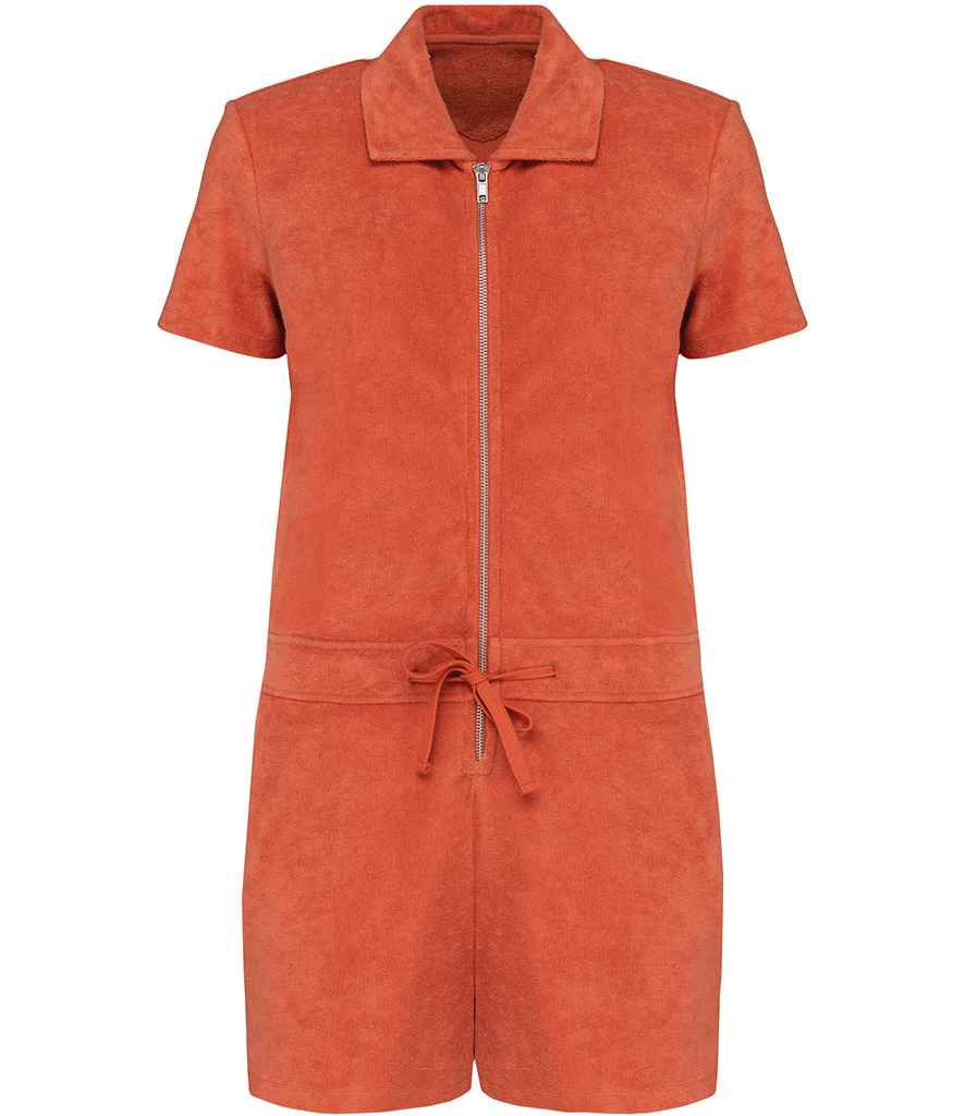 Stylish model wearing a luxury zipped jumpsuit in an elegant setting, embodying sustainable fashion with a focus on comfort and modern design.