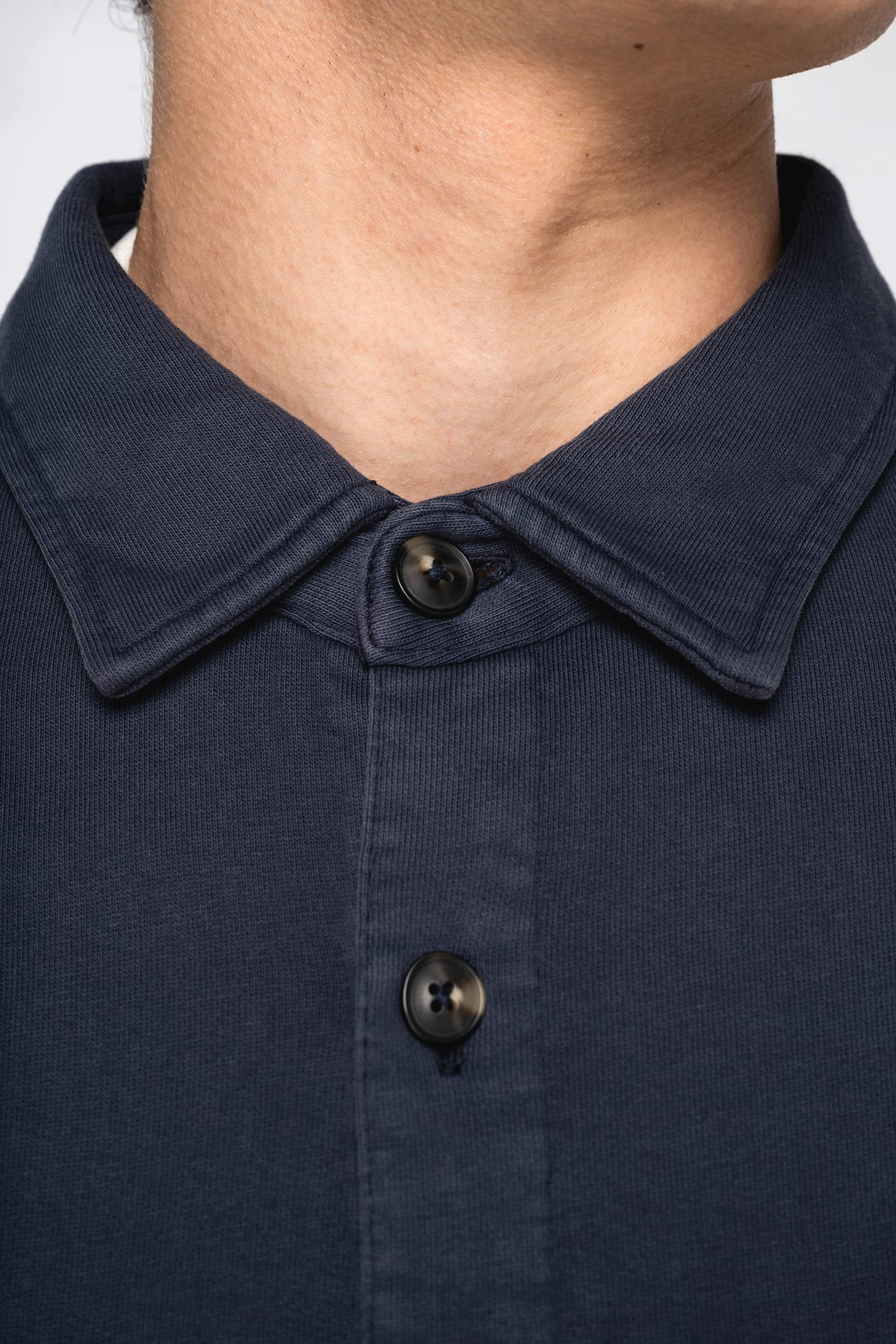 Luxury organic cotton faded overshirt for men, showcasing a vintage-inspired design in soft, washed fabric, ideal for stylish layering.