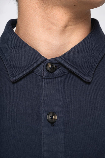 Luxury organic cotton faded overshirt for men, showcasing a vintage-inspired design in soft, washed fabric, ideal for stylish layering.