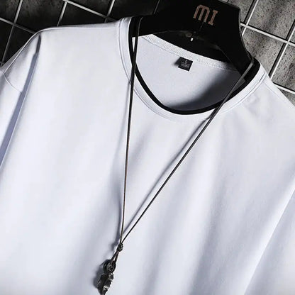 Stylish Men's Summer Casual Tee from Dazzling Dreams Studio showcasing its breathable material and relaxed fit, perfect for warm weather.