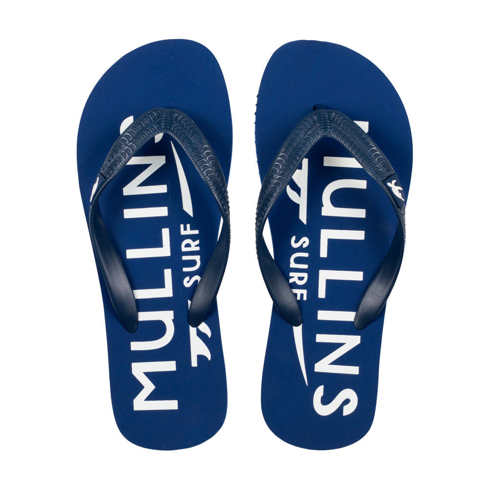 Luxurious blue flip flops by Mullins Bay featuring a stylish slim design and Mullins Turtle branding, perfect for summer outings.