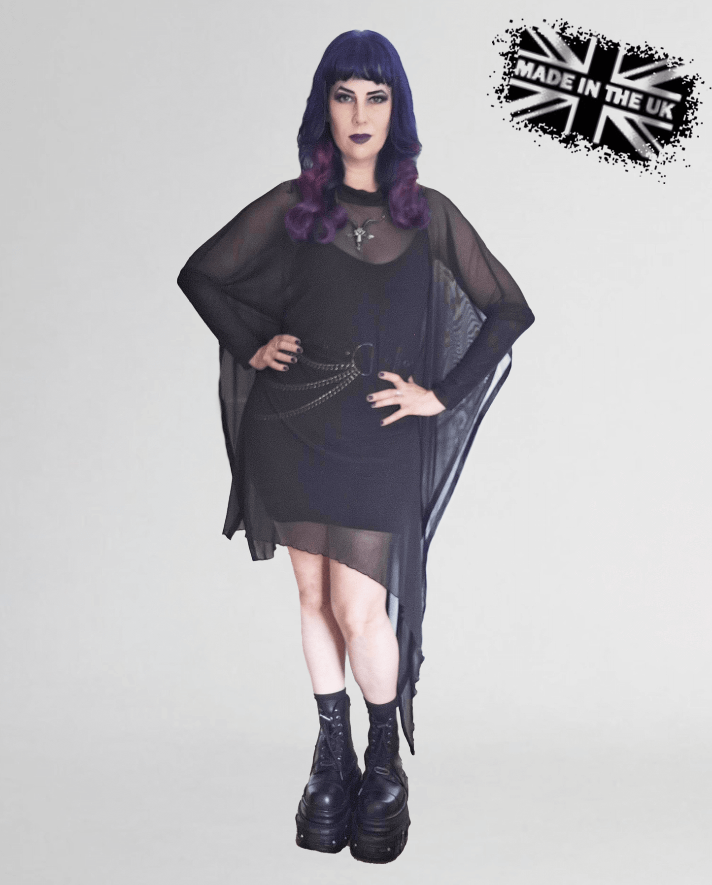 Necessary Evil Anahita Mesh Layer Dress showcasing a dramatic asymmetrical hem and double-layer mesh sleeves, accentuated with vegan leather trim.