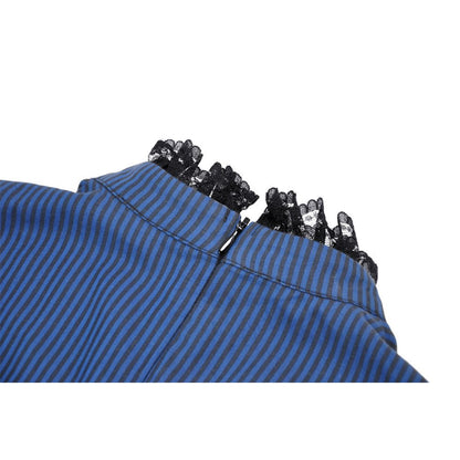 Fashion model showcasing the Dark In Love Nilima Dress in a stylish setting, embodying elegance for special occasions.