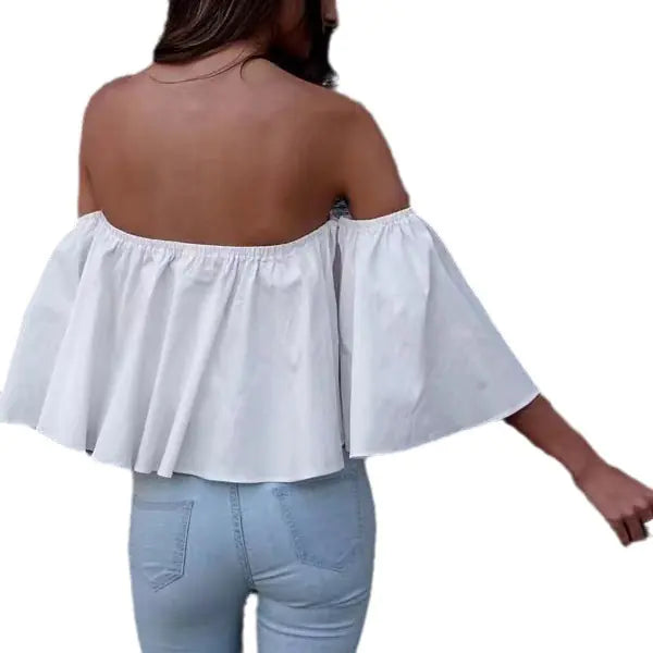 Chic yellow chiffon blouse in an off-shoulder style, exuding a vibrant and luxurious aura in a casual setting.