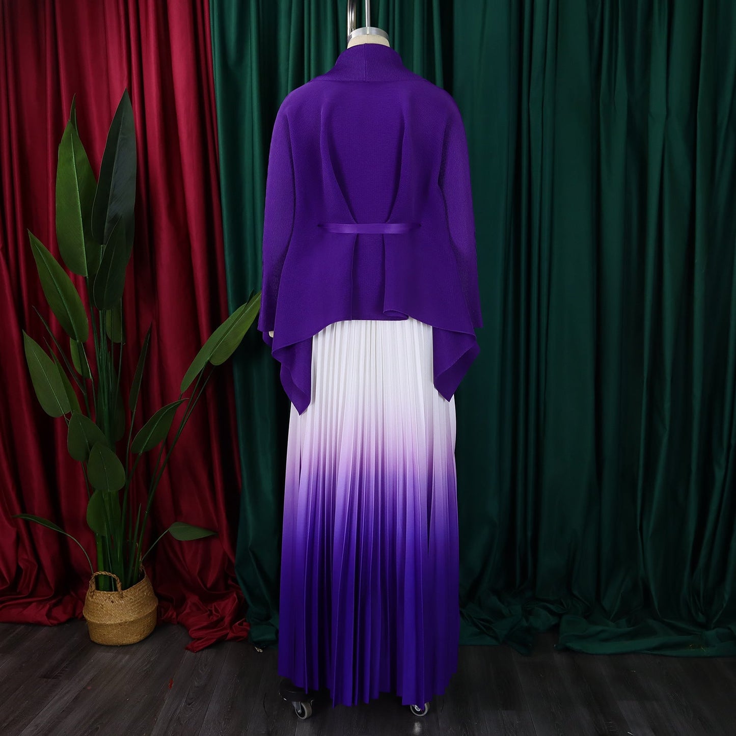 Exquisite CM.YAYA two-piece set showcasing a v-neck blouse with batwing sleeves and a floor-length pleated skirt, a staple for high-end women's fashion.