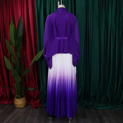 Exquisite CM.YAYA two-piece set showcasing a v-neck blouse with batwing sleeves and a floor-length pleated skirt, a staple for high-end women's fashion.