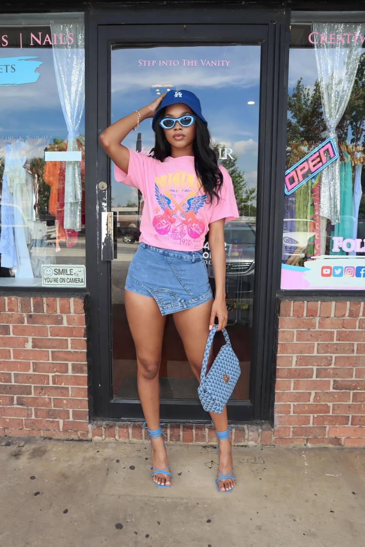 Elegant side view of CM.YAYA Women's Wide Leg Flare Jeans, highlighting the unique hollow cutout details for a flattering silhouette.