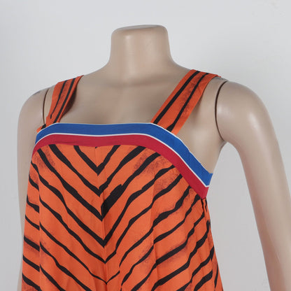 CM.YAYA Women’s Striped Wide Leg Sleeveless Jumpsuit elegantly paired with high heels, perfect for summer evening events.