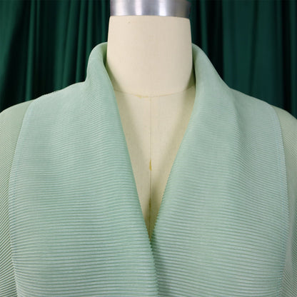 Chic and trendy women's fashion from CM.YAYA, featuring a stylish blouse with batwing sleeves and a matching pleated skirt for autumn and winter.