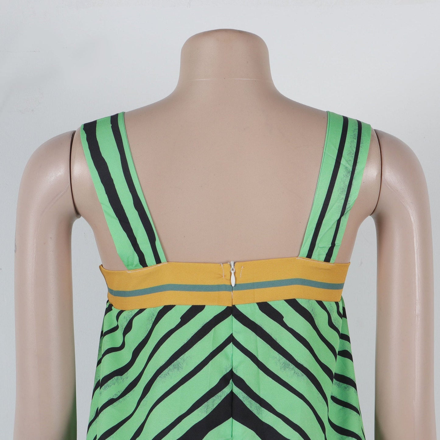 Model wearing the CM.YAYA Women’s Striped Jumpsuit with Pockets by Hot Trends Area, illustrating effortless summer fashion with a casual yet sophisticated look.