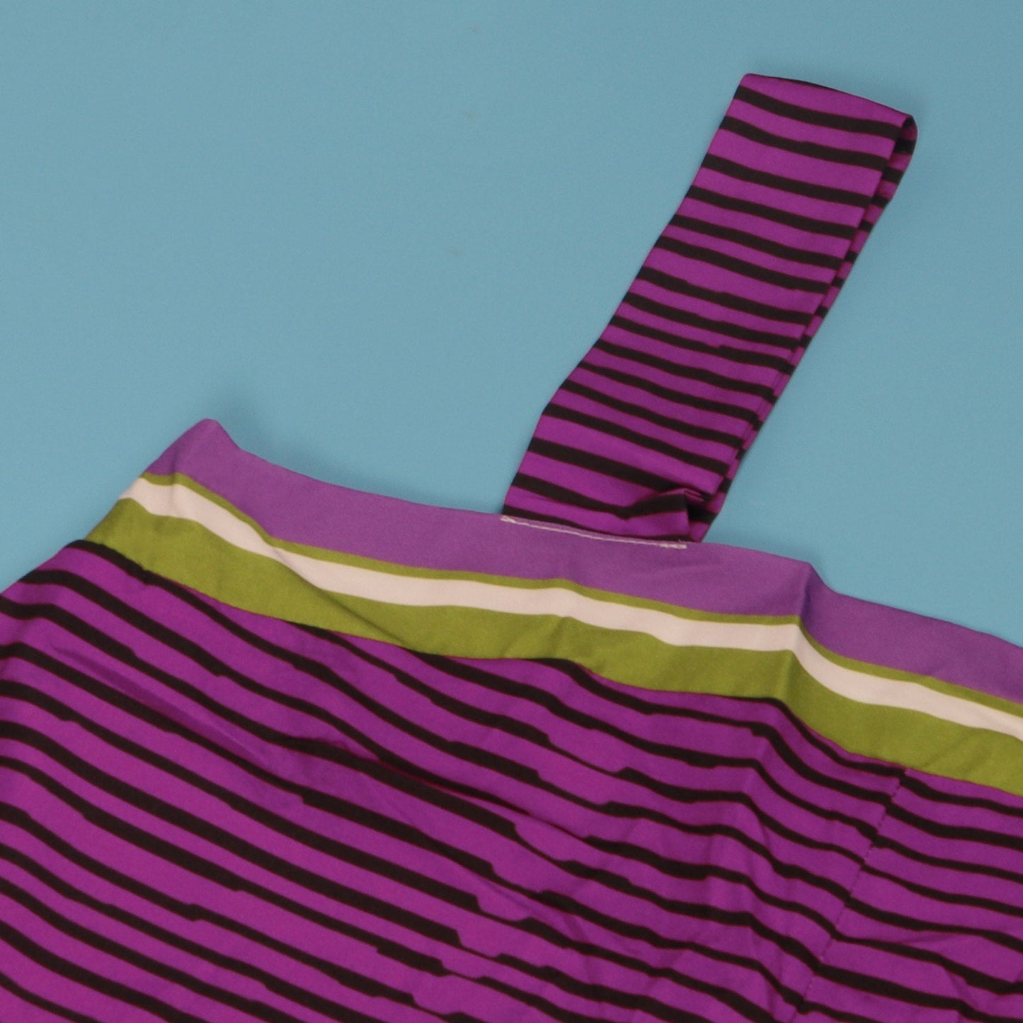 Close-up of CM.YAYA Women’s Striped Wide Leg Jumpsuit showcasing its high-quality fabric and stylish striped pattern, ideal for fashion-forward women.