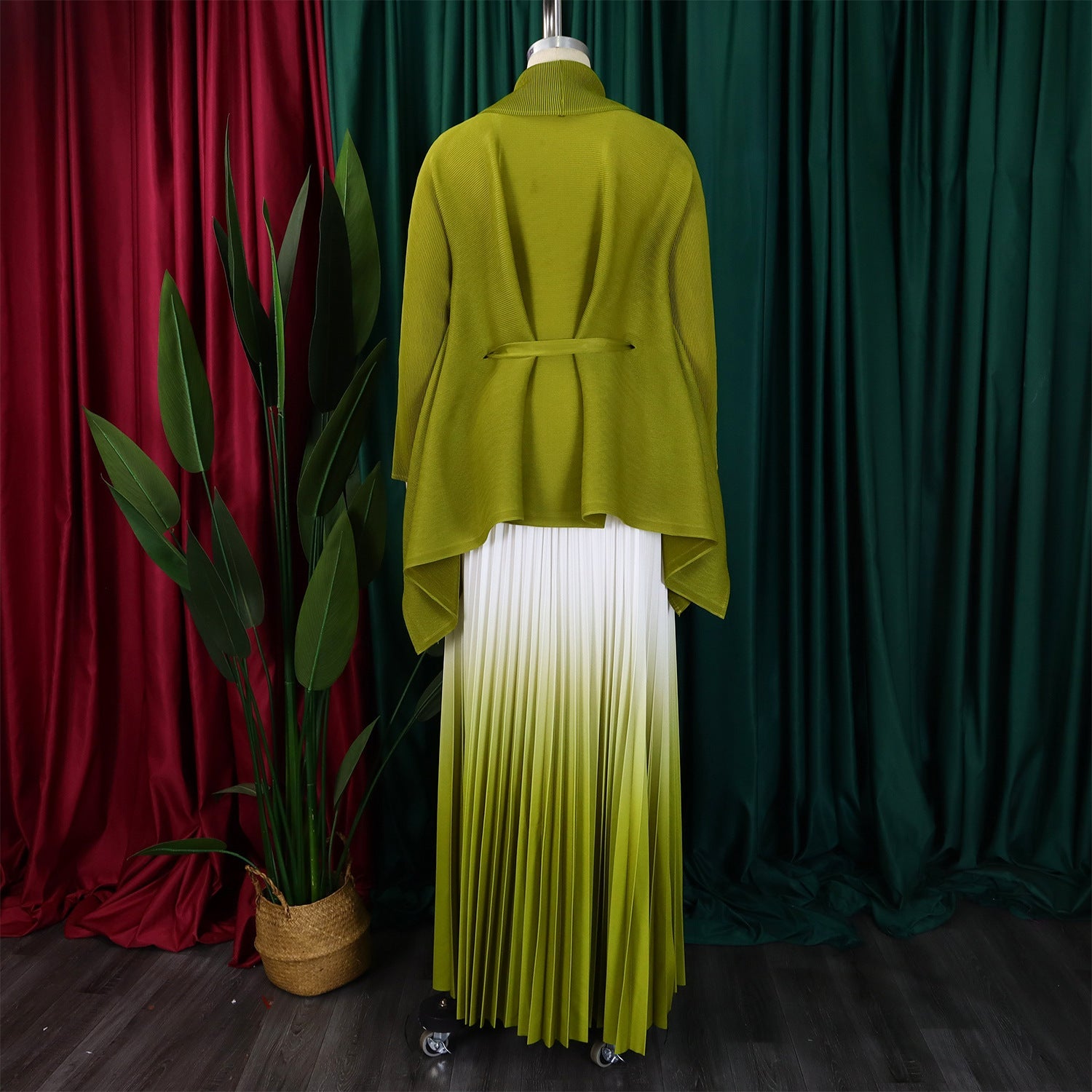 Elegant CM.YAYA women's autumn/winter outfit featuring a gradient full sleeve blouse and a pleated long skirt set, exuding luxury and sophistication.