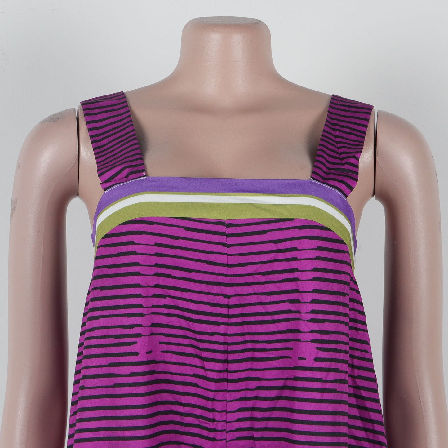 Close-up view of the CM.YAYA jumpsuit's comfortable fabric and intricate striped detailing, perfect for stylish summer occasions.