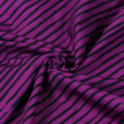 Model wearing CM.YAYA Women’s Striped Wide Leg Sleeveless Jumpsuit, demonstrating its elegant silhouette and practical pocket feature for a sophisticated look.