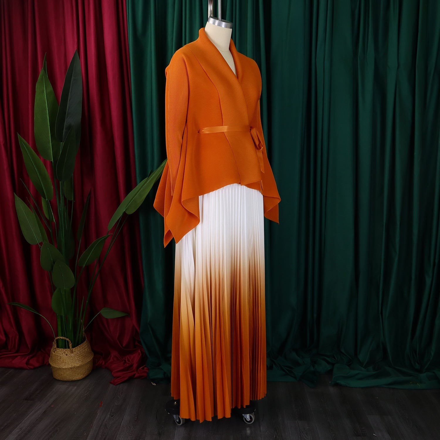 Sophisticated CM.YAYA Women's Gradient Two-Piece Blouse and Pleated Long Skirt Set, elegantly styled for Autumn and Winter with a fashionable belt.