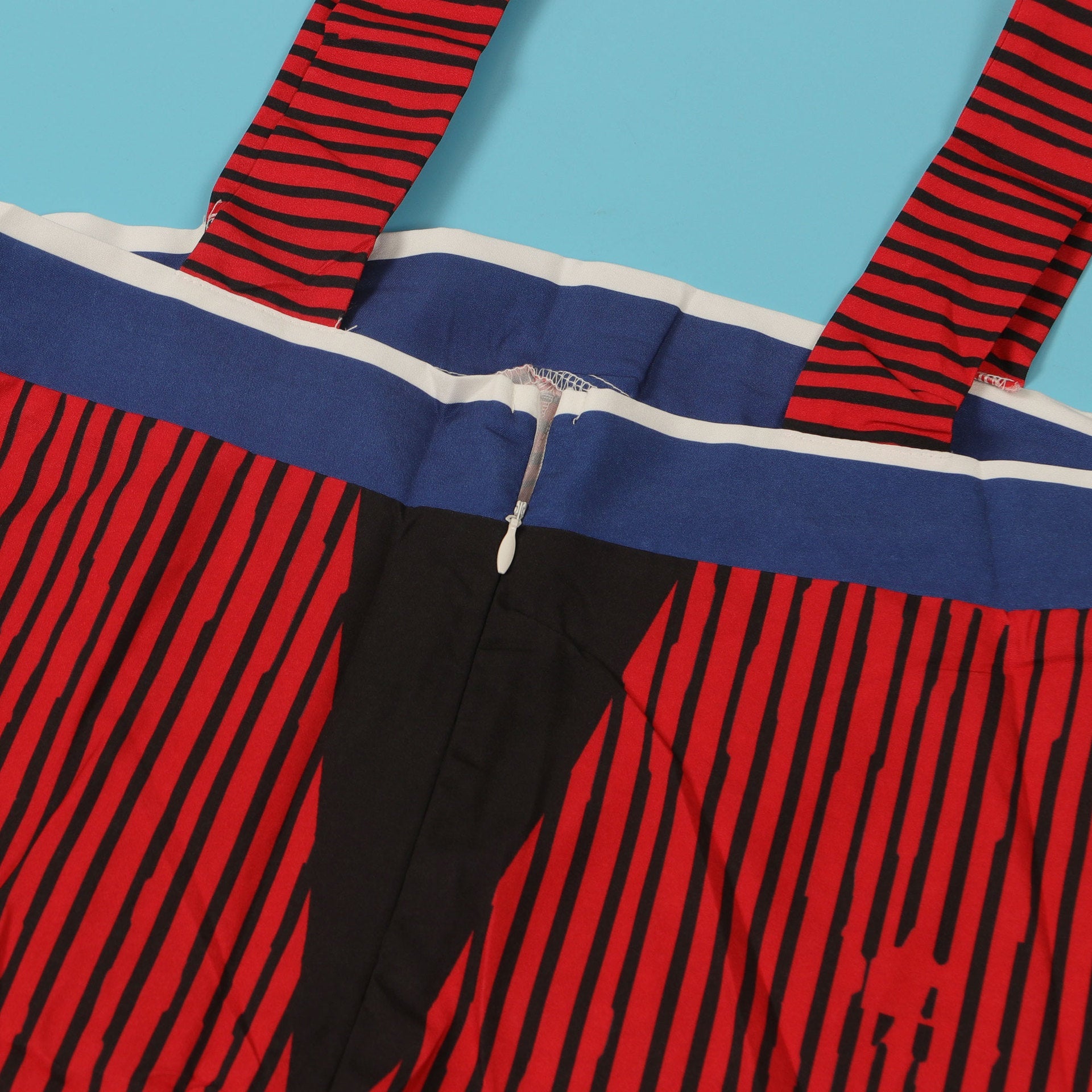 CM.YAYA Women's Luxury Striped Wide Leg Sleeveless Jumpsuit with Pockets, elegantly showcasing a flattering high waist design.