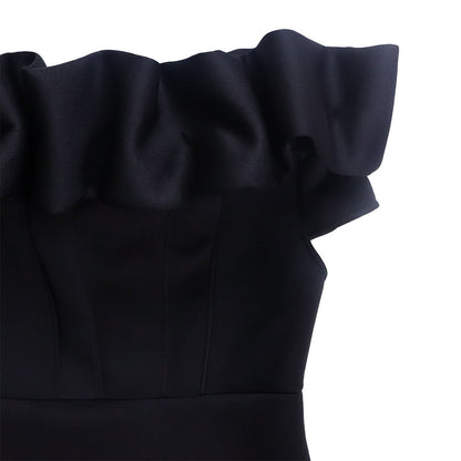 Captivating side view of the sophisticated mermaid evening gown, emphasizing the graceful flow of the fabric and its exquisite craftsmanship.