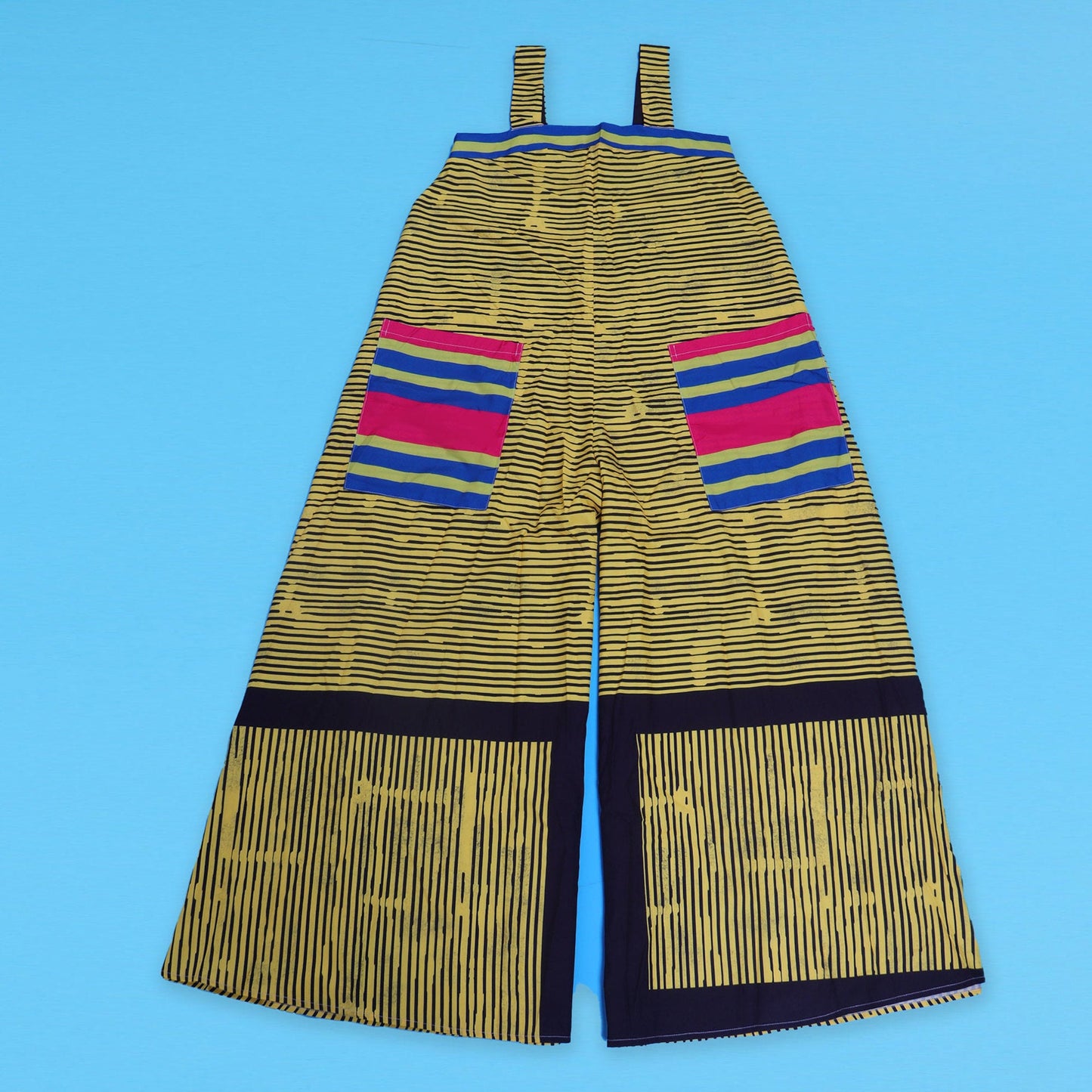 Stylish and chic CM.YAYA Striped Wide Leg Jumpsuit with pockets, designed for ultimate comfort and sophistication. Ideal for brunch or evening wear.