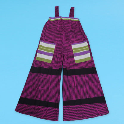 CM.YAYA jumpsuit styled with trendy accessories, demonstrating its versatility for both casual and upscale summer events.